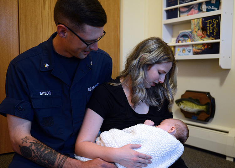Coast guard couple with baby